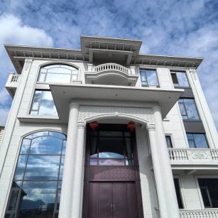 铜陵白麻别墅外墙干挂石材效果示例