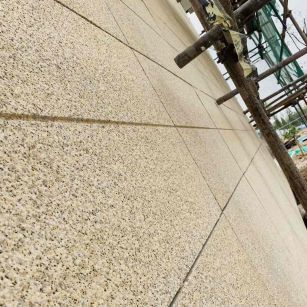 铜陵 黄金麻花岗岩荔枝面外墙干挂石材效果示例