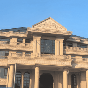 铜陵黄金麻别墅外墙干挂石材效果示例