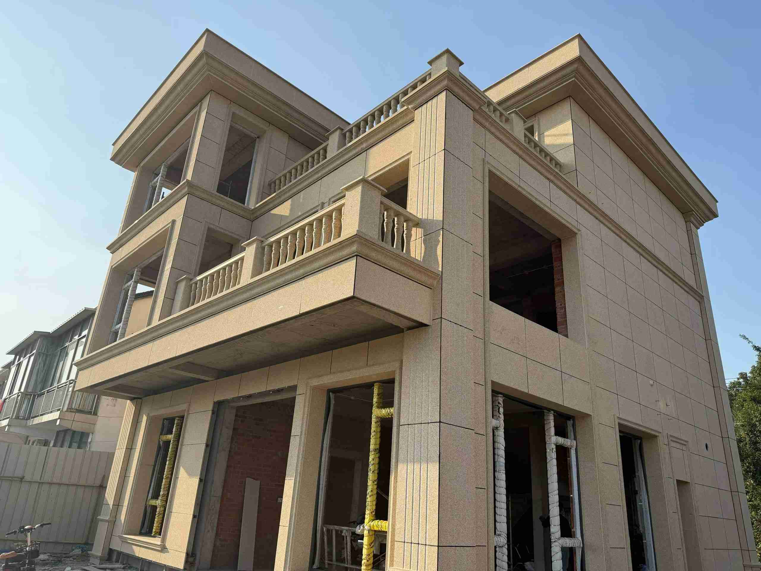 铜陵 黄金麻花岗岩石材荔枝面外墙干挂效果展示