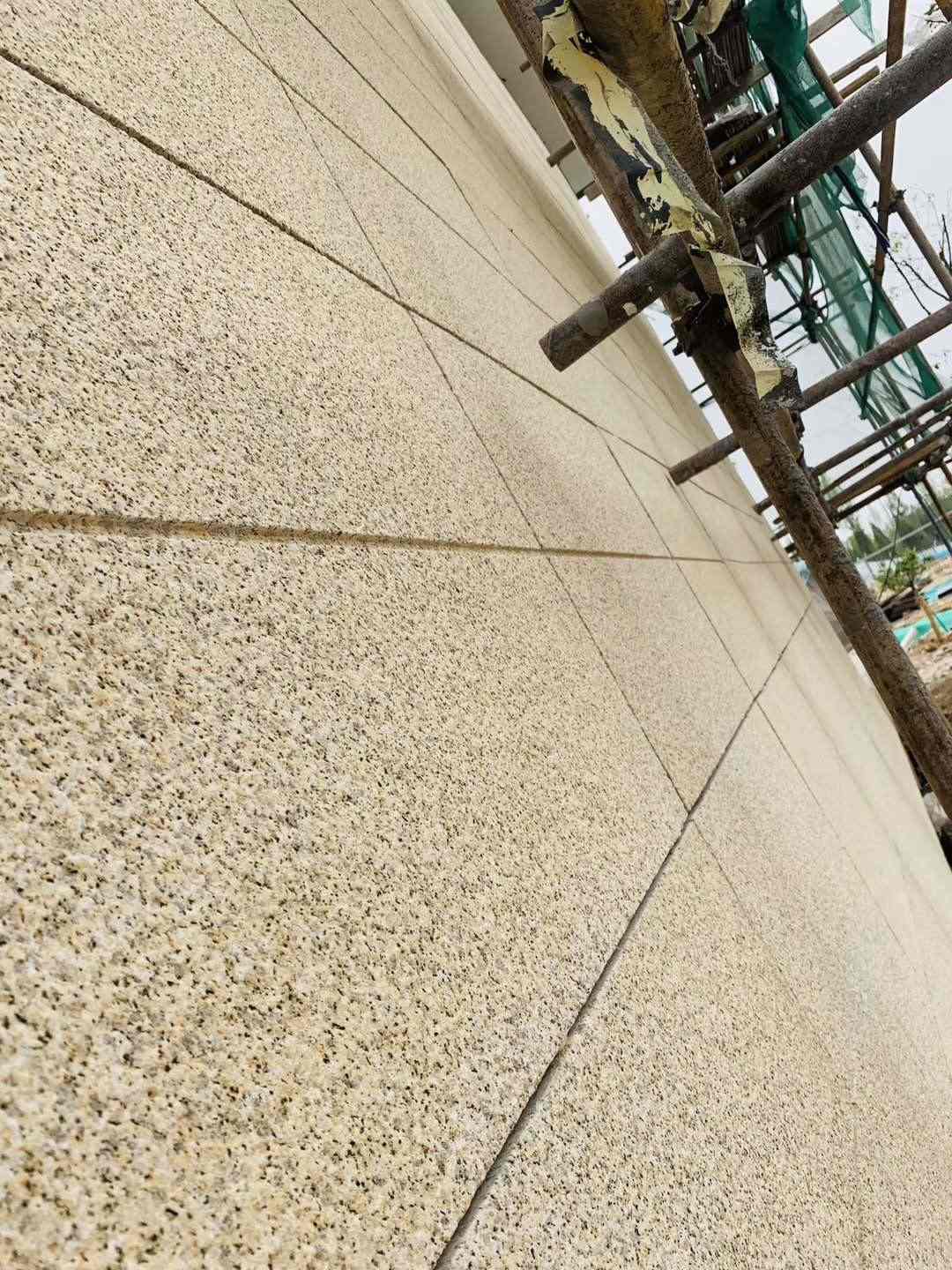 铜陵 黄金麻花岗岩荔枝面外墙干挂石材效果示例